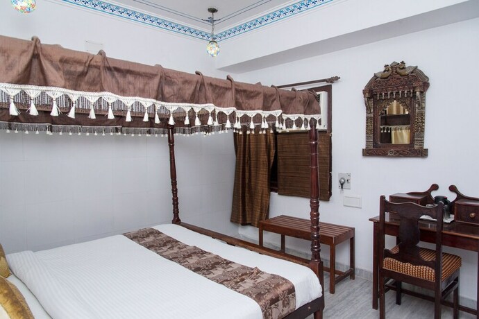 Imagen de la habitación del Hotel Oyo 10319 Pichola Haveli. Foto 21