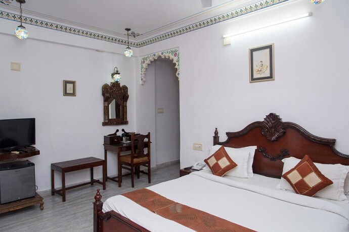 Imagen de la habitación del Hotel Oyo 10319 Pichola Haveli. Foto 23
