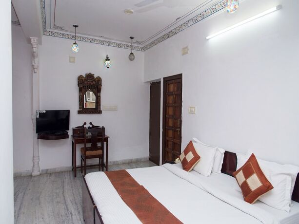 Imagen de la habitación del Hotel Oyo 10319 Pichola Haveli. Foto 26