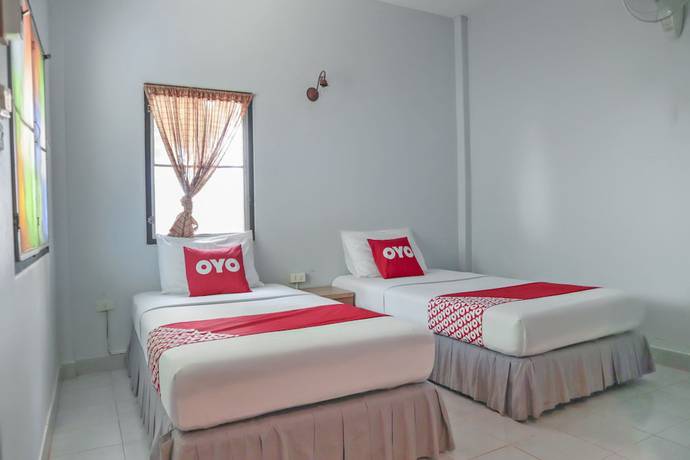 Imagen de la habitación del Hotel Oyo 1033 Saladan Beach Resort. Foto 2