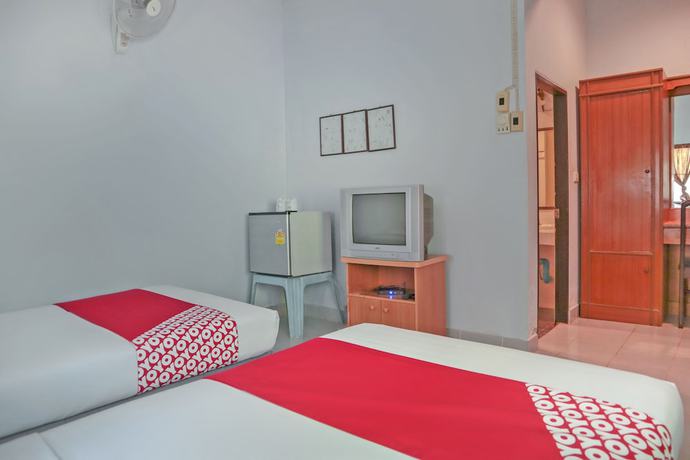 Imagen de la habitación del Hotel Oyo 1033 Saladan Beach Resort. Foto 3