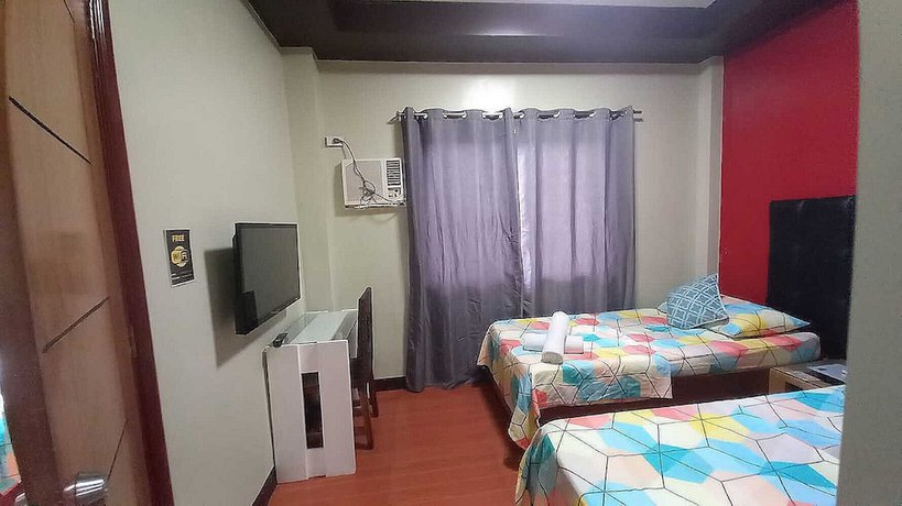 Imagen de la habitación del Hotel Oyo 1037 Lendes Tourist Inn Main. Foto 4