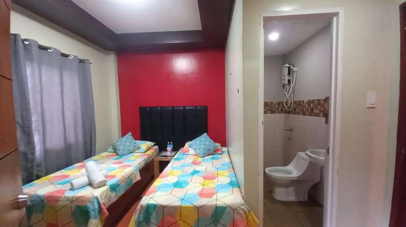 Imagen de la habitación del Hotel Oyo 1037 Lendes Tourist Inn Main. Foto 8