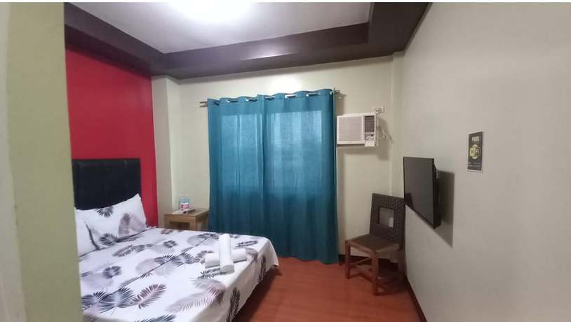 Imagen de la habitación del Hotel Oyo 1037 Lendes Tourist Inn Main. Foto 11