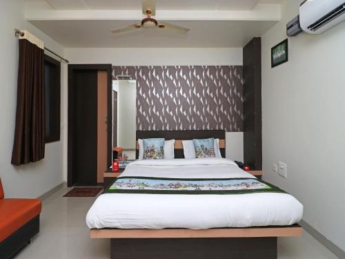Imagen de la habitación del Hotel Oyo 10414 Tushar Residency. Foto 2