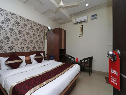 Imagen de la habitación del Hotel Oyo 10414 Tushar Residency. Foto 8