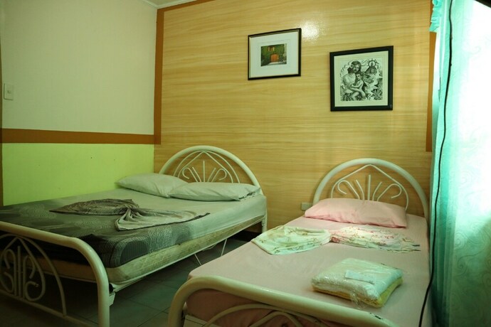 Imagen de la habitación del Hotel Oyo 1048 Jomckayl Apartelle. Foto 17