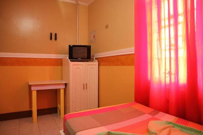 Imagen de la habitación del Hotel Oyo 1048 Jomckayl Apartelle. Foto 21