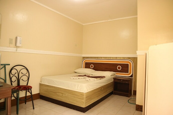 Imagen de la habitación del Hotel Oyo 1048 Jomckayl Apartelle. Foto 26