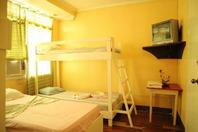 Imagen de la habitación del Hotel Oyo 1048 Jomckayl Apartelle. Foto 36