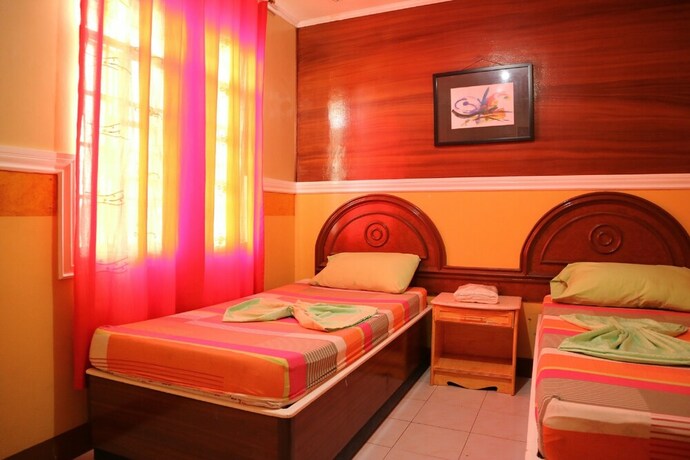 Imagen de la habitación del Hotel Oyo 1048 Jomckayl Apartelle. Foto 39