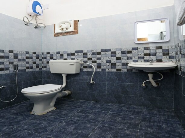 Imagen de la habitación del Hotel Oyo 10512 Toshani Palace. Foto 11