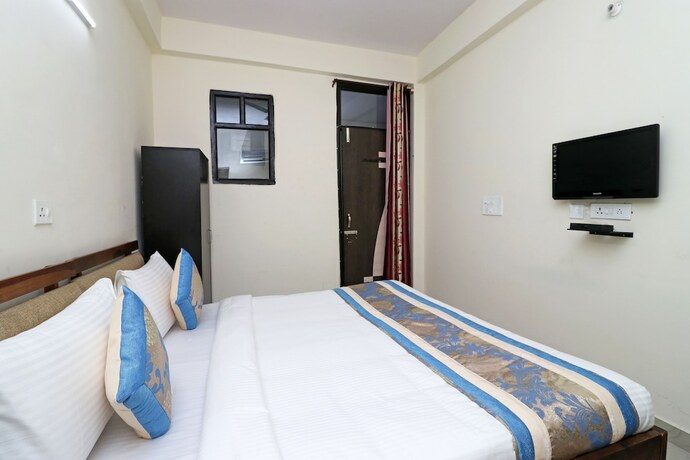 Imagen de la habitación del Hotel Oyo 10663 Homestead. Foto 2