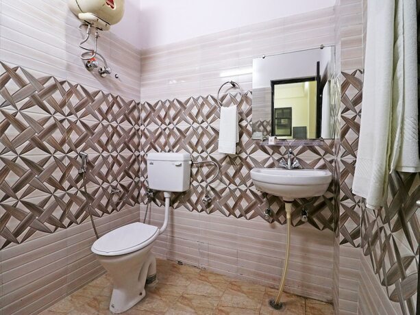 Imagen de la habitación del Hotel Oyo 10663 Homestead. Foto 8