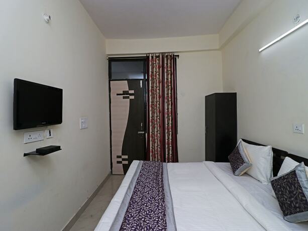 Imagen de la habitación del Hotel Oyo 10663 Homestead. Foto 9