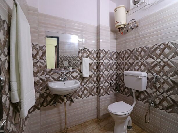 Imagen de la habitación del Hotel Oyo 10663 Homestead. Foto 15
