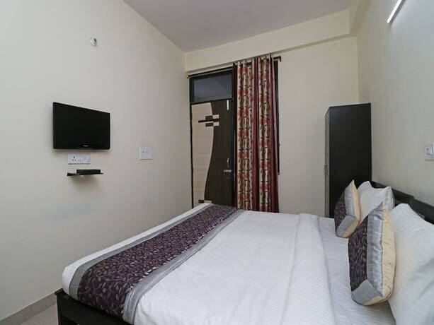 Imagen de la habitación del Hotel Oyo 10663 Homestead. Foto 16