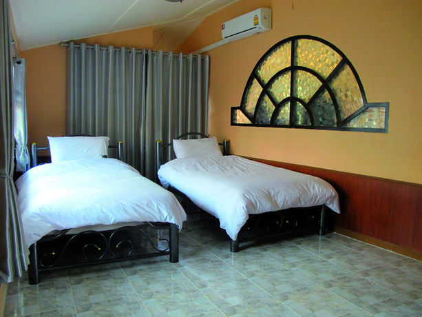 Imagen de la habitación del Hotel Oyo 1068 Nn Apartment. Foto 4