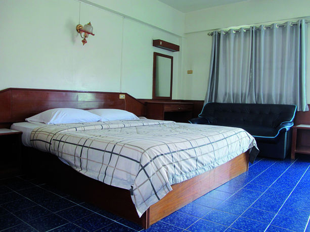 Imagen de la habitación del Hotel Oyo 1068 Nn Apartment. Foto 8