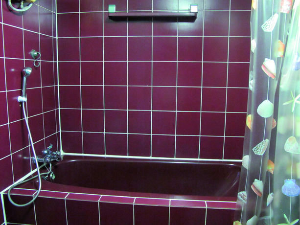 Imagen de la habitación del Hotel Oyo 1068 Nn Apartment. Foto 9