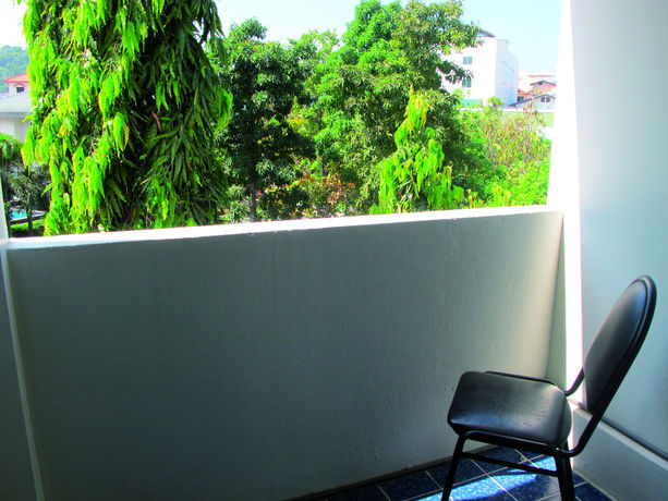 Imagen de la habitación del Hotel Oyo 1068 Nn Apartment. Foto 13