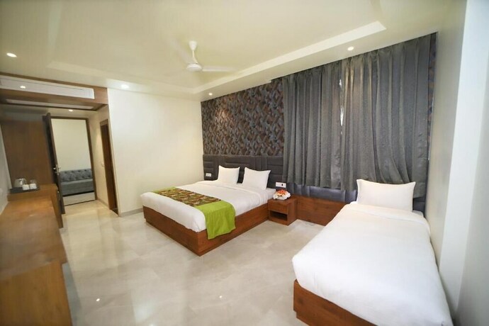 Imagen de la habitación del Hotel Oyo 10876 Taj Signature. Foto 8