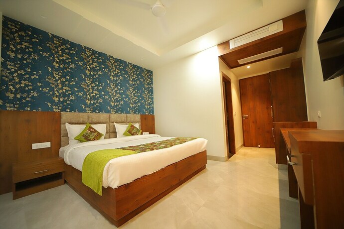 Imagen de la habitación del Hotel Oyo 10876 Taj Signature. Foto 11