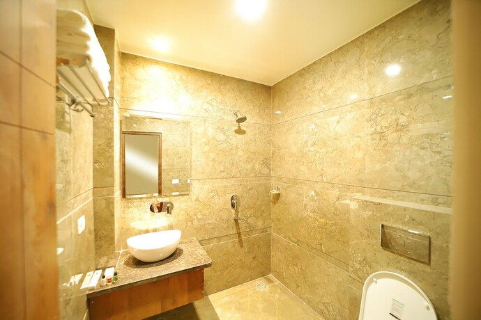 Imagen de la habitación del Hotel Oyo 10876 Taj Signature. Foto 12