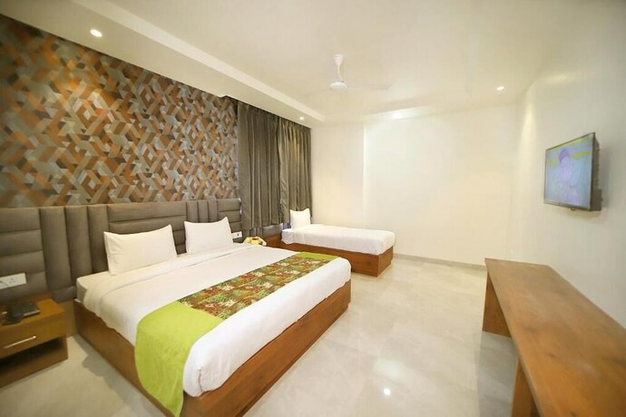 Imagen de la habitación del Hotel Oyo 10876 Taj Signature. Foto 14