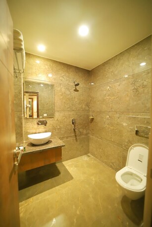 Imagen de la habitación del Hotel Oyo 10876 Taj Signature. Foto 16