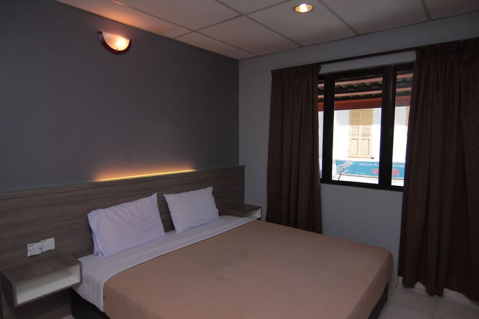 Imagen de la habitación del Hotel Oyo 1088 Yellow Mansion Banda Kaba. Foto 3