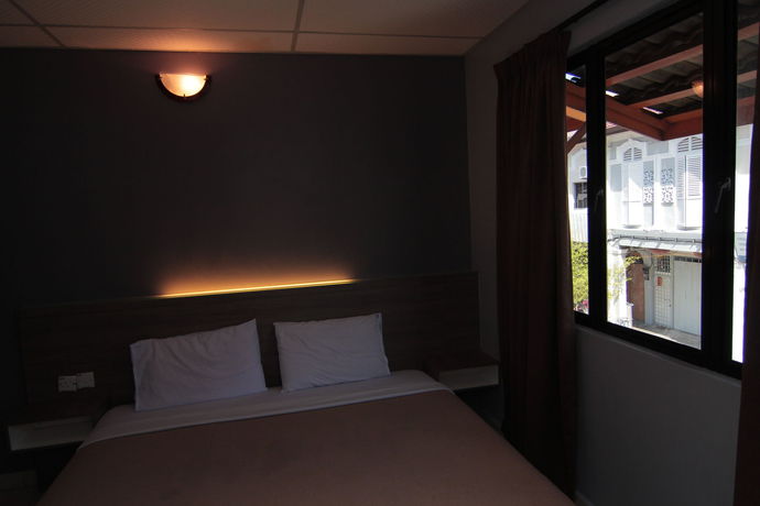 Imagen de la habitación del Hotel Oyo 1088 Yellow Mansion Banda Kaba. Foto 4