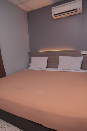 Imagen de la habitación del Hotel Oyo 1088 Yellow Mansion Banda Kaba. Foto 5