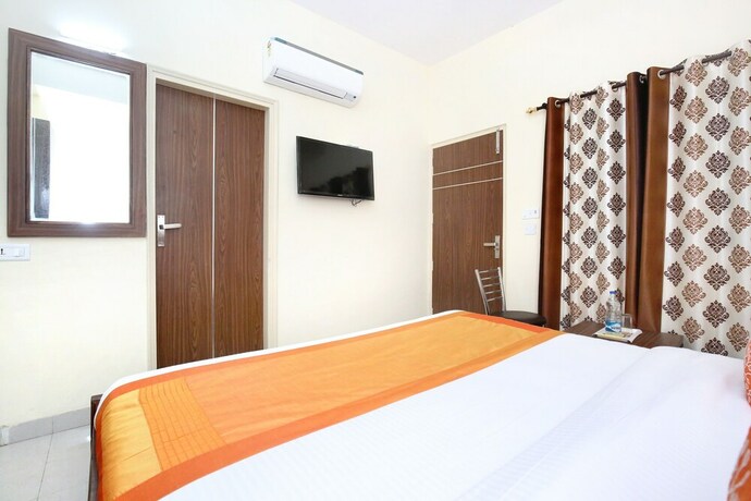 Imagen de la habitación del Hotel Oyo 10891 Starwood. Foto 13
