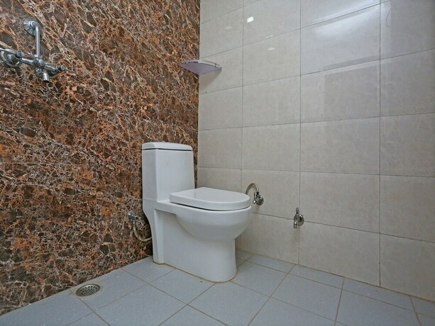 Imagen de la habitación del Hotel Oyo 10948 Home Modern Studio Bhumiyadhar. Foto 12