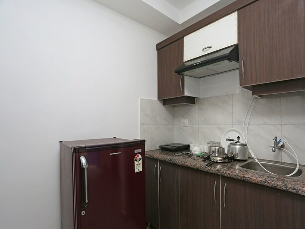 Imagen de la habitación del Hotel Oyo 10948 Home Modern Studio Bhumiyadhar. Foto 13