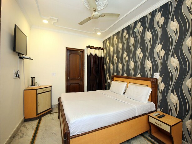 Imagen de la habitación del Hotel Oyo 10990 Gobind Regency. Foto 5