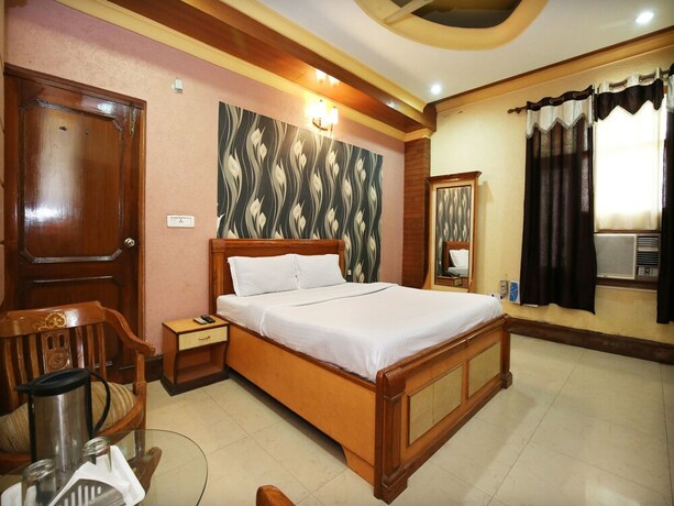 Imagen de la habitación del Hotel Oyo 10990 Gobind Regency. Foto 8