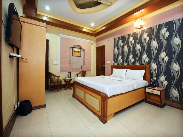 Imagen de la habitación del Hotel Oyo 10990 Gobind Regency. Foto 9