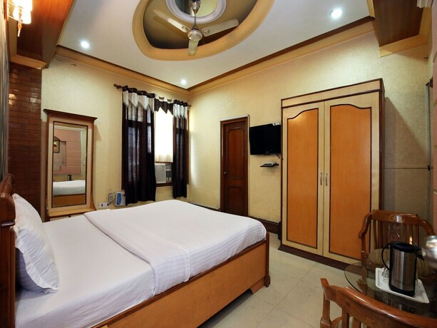 Imagen de la habitación del Hotel Oyo 10990 Gobind Regency. Foto 10