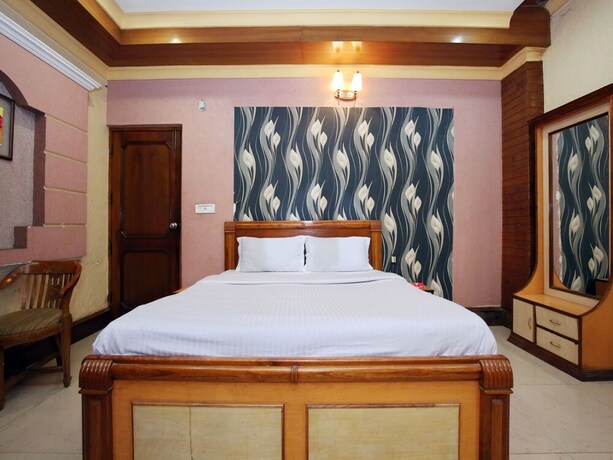 Imagen de la habitación del Hotel Oyo 10990 Gobind Regency. Foto 14