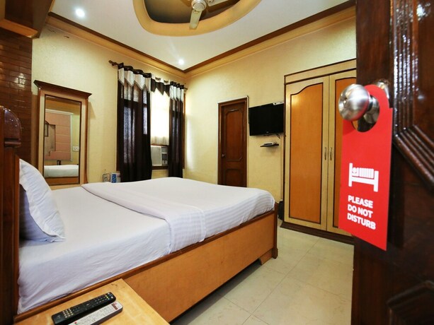 Imagen de la habitación del Hotel Oyo 10990 Gobind Regency. Foto 15
