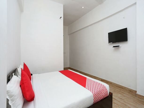 Imagen de la habitación del Hotel Oyo 11008 The Ashoka. Foto 18