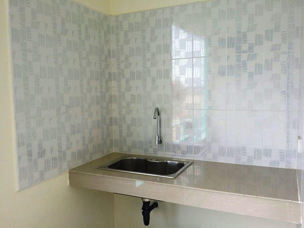 Imagen de la habitación del Hotel Oyo 1138 Mind Mansion. Foto 4