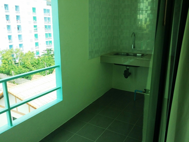 Imagen de la habitación del Hotel Oyo 1138 Mind Mansion. Foto 6