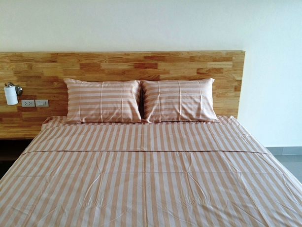 Imagen de la habitación del Hotel Oyo 1138 Mind Mansion. Foto 10