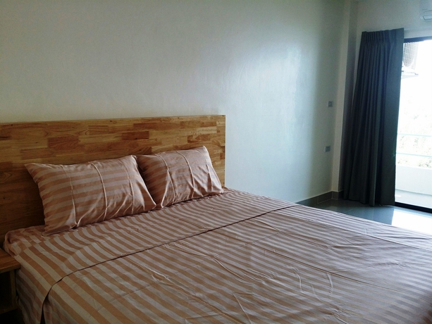 Imagen de la habitación del Hotel Oyo 1138 Mind Mansion. Foto 11