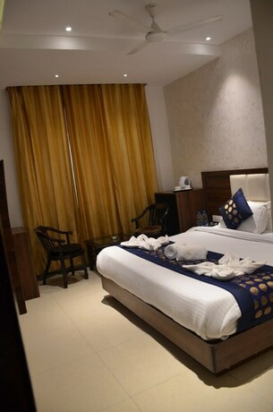 Imagen de la habitación del Hotel Oyo 11680 Grand Star. Foto 5