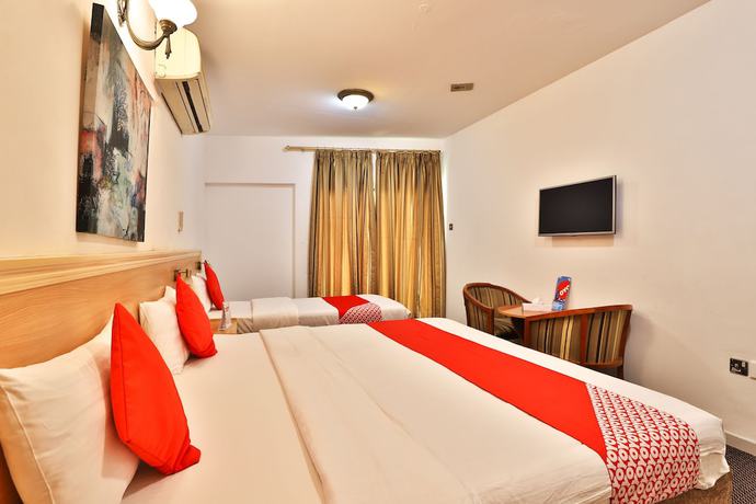 Imagen de la habitación del Hotel Oyo 118 Dallas. Foto 1