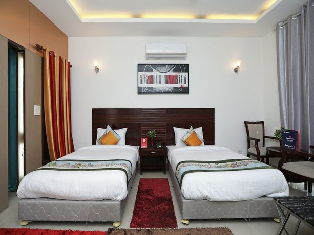 Imagen de la habitación del Hotel Oyo 11872 Heaven Inn. Foto 11
